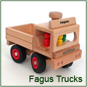 Wooden cars and trucks by Fagus